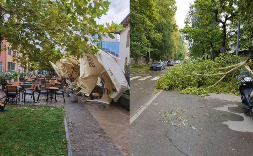 Dramatične fotografije nevremena u BiH: Vjetar lomio stabla, bašte kafića...